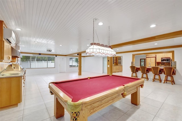 recreation room featuring a wall unit AC, light tile patterned floors, and billiards