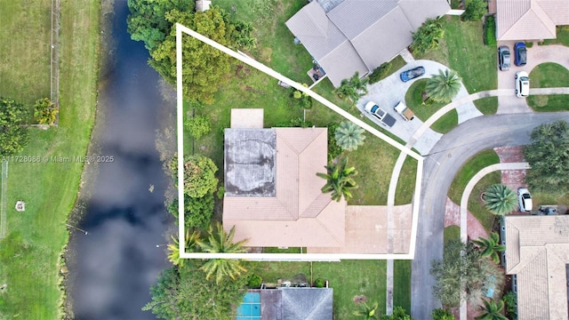 aerial view featuring a water view