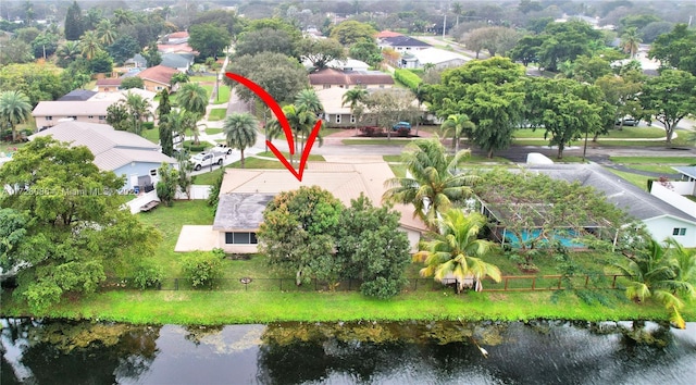 aerial view featuring a water view and a residential view