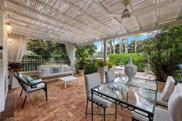 view of patio / terrace featuring a pergola, outdoor lounge area, and ceiling fan