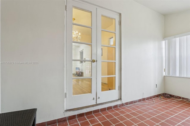 unfurnished room with french doors