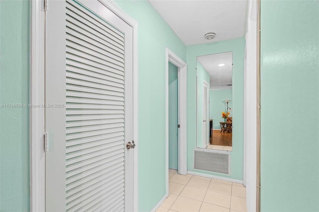 hallway with light tile patterned flooring