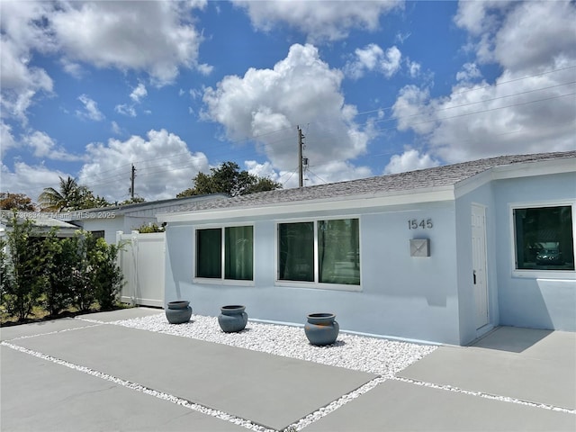 rear view of house with a patio area