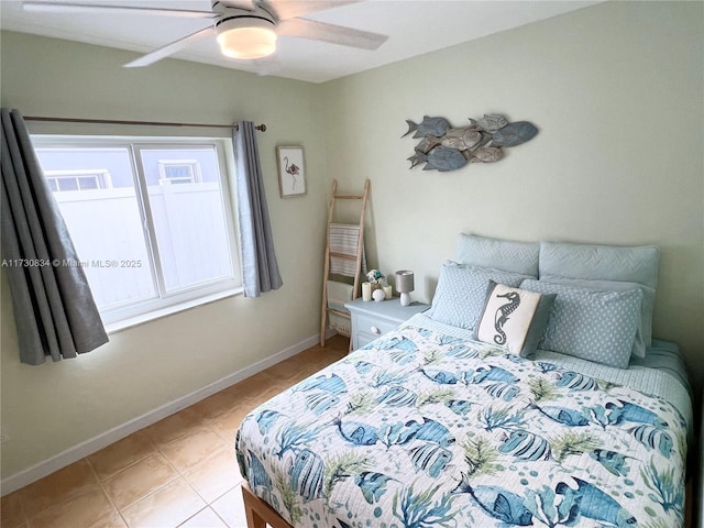 bedroom featuring light tile patterned floors and ceiling fan