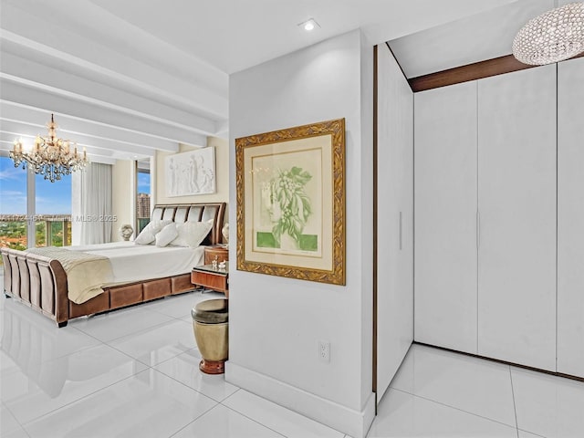 bedroom with beamed ceiling, a chandelier, and light tile patterned flooring