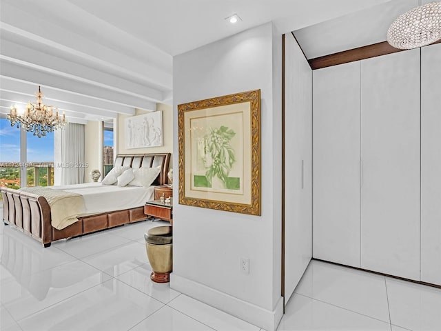 3201 NE 183rd St Unit 1207, Aventura, FL 33160 - bedroom with a chandelier and tile patterned flooring