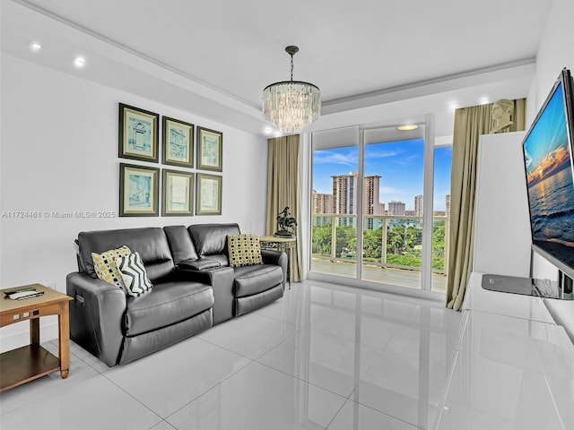 tiled living room featuring an inviting chandelier