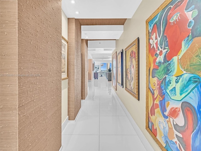 corridor featuring light tile patterned floors