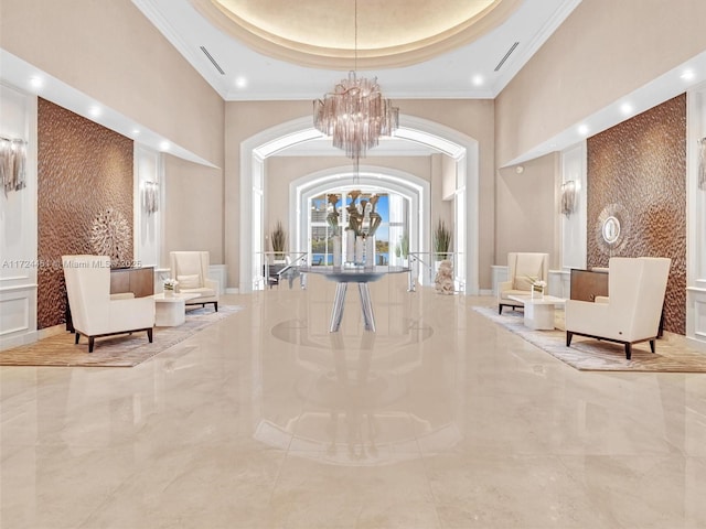 3201 NE 183rd St Unit 1207, Aventura, FL 33160 - building lobby with a high ceiling, crown molding, and recessed lighting