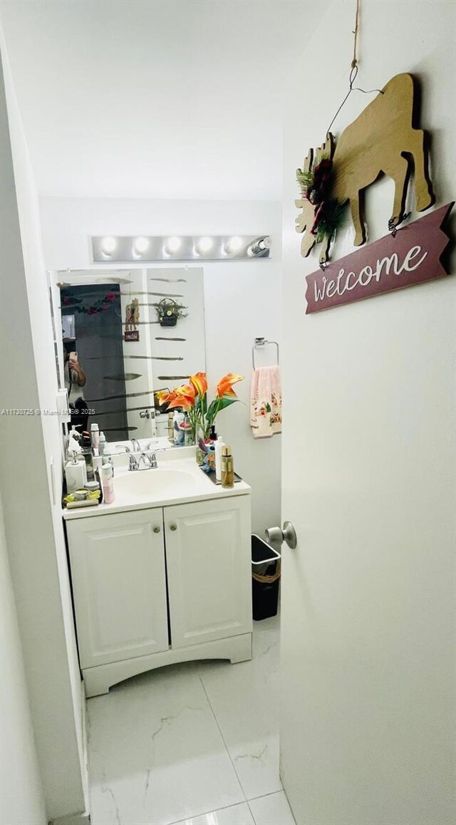 1401 NE 191st St Unit D112, Miami, FL 33179 - interior space featuring marble finish floor and vanity