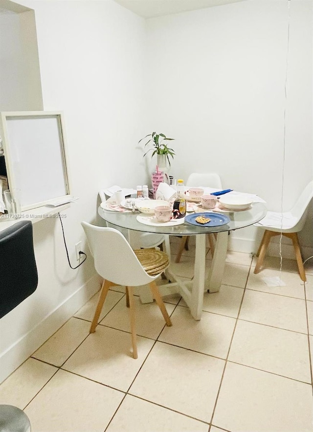 1401 NE 191st St Unit D112, Miami, FL 33179 - tiled dining space with baseboards