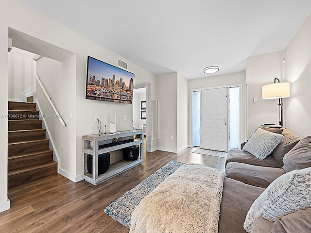 living room featuring dark hardwood / wood-style floors