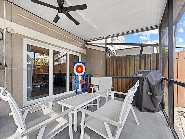 sunroom / solarium with ceiling fan