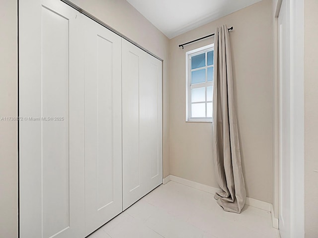 interior space featuring light tile patterned floors