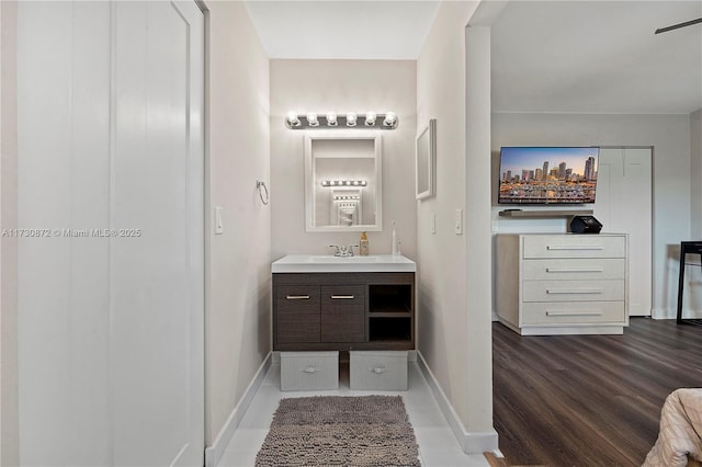 bathroom with wood-type flooring and vanity