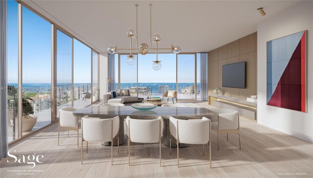 sunroom featuring a water view and an inviting chandelier