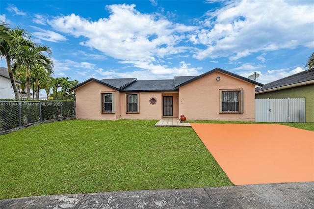 ranch-style house with a front lawn