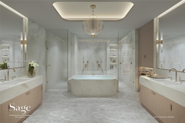 bathroom featuring vanity and shower with separate bathtub