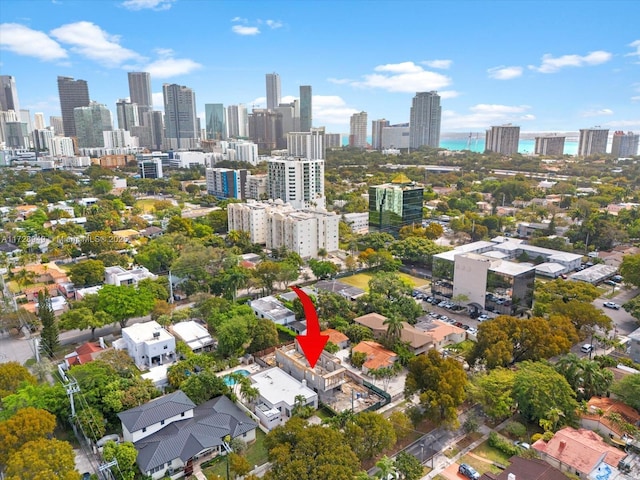 birds eye view of property featuring a city view