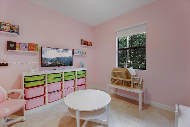 recreation room featuring light tile patterned flooring