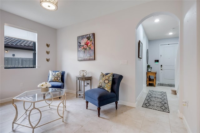 living area featuring light tile patterned floors