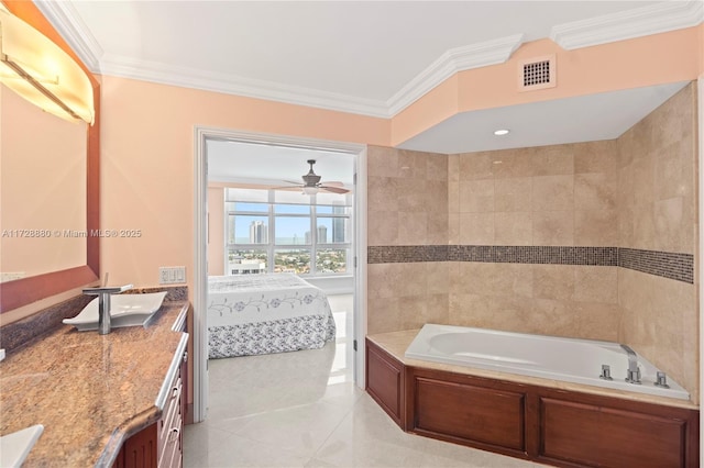 bathroom with vanity, ceiling fan, crown molding, a bath, and tile patterned floors