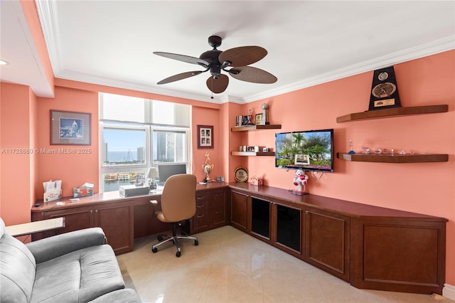 tiled office featuring crown molding and ceiling fan