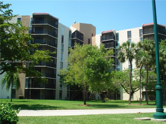 view of community with a yard