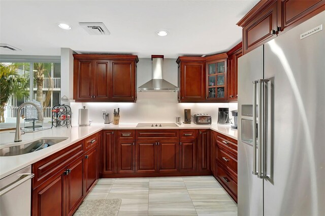 kitchen with hanging light fixtures, stainless steel appliances, and sink