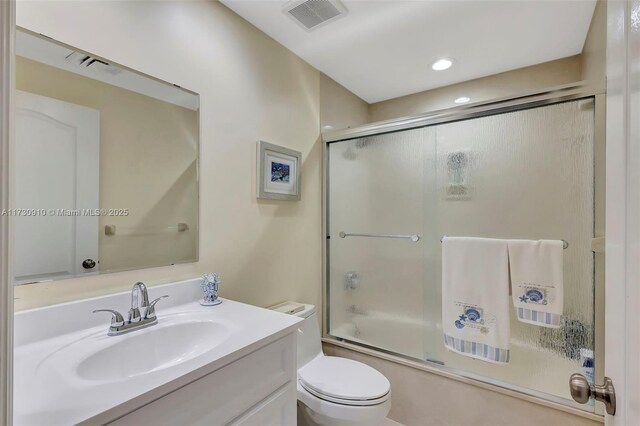 bedroom featuring a water view and ceiling fan