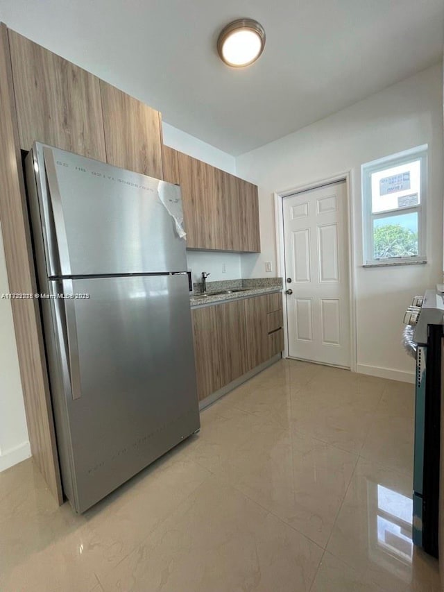 kitchen featuring sink and stainless steel appliances