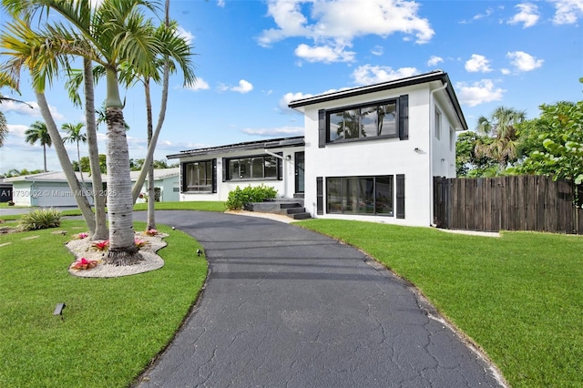 view of front of house with a front lawn