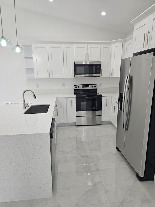 kitchen featuring lofted ceiling, stainless steel appliances, a sink, marble finish floor, and open shelves