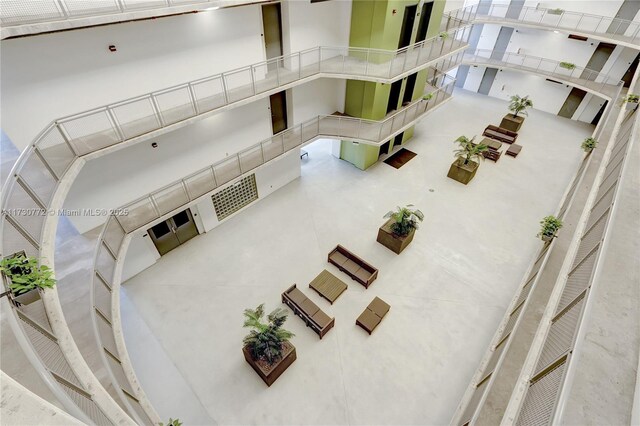 corridor with concrete flooring