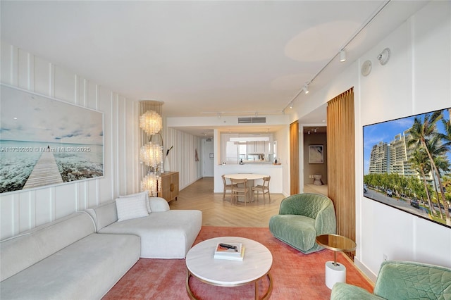 living room featuring parquet flooring