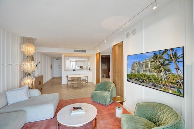 living room with light parquet floors