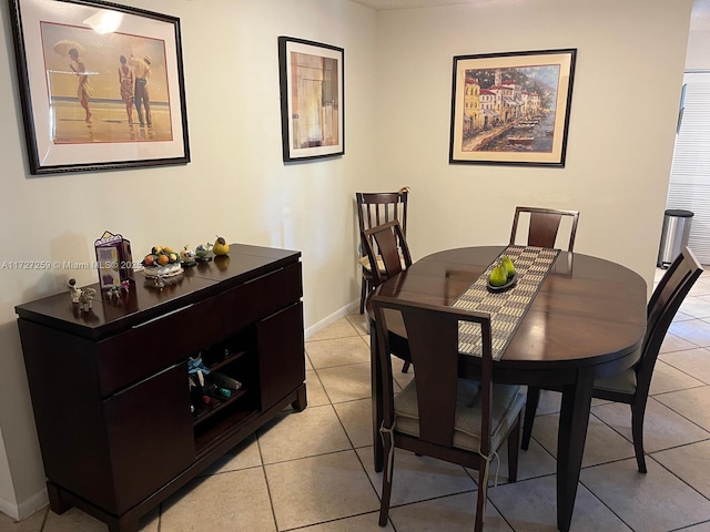 9040 SW 125th Ave Unit D210, Miami, FL 33186 - dining room with light tile patterned floors and baseboards