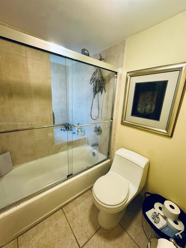 9040 SW 125th Ave Unit D210, Miami, FL 33186 - bathroom featuring enclosed tub / shower combo, toilet, and tile patterned floors