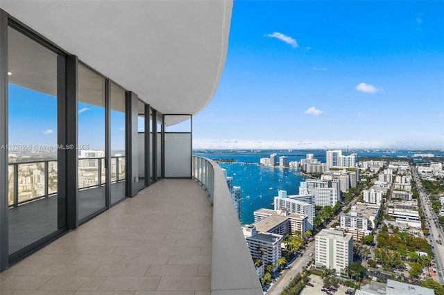 balcony featuring a water view