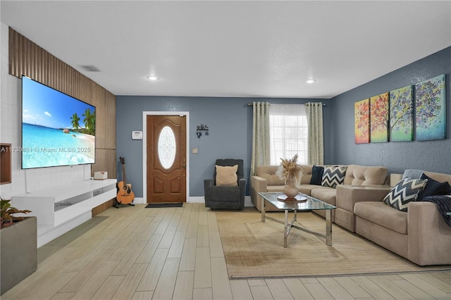 living room featuring light wood-type flooring