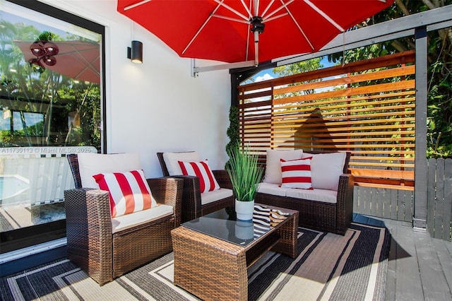 wooden deck featuring an outdoor living space