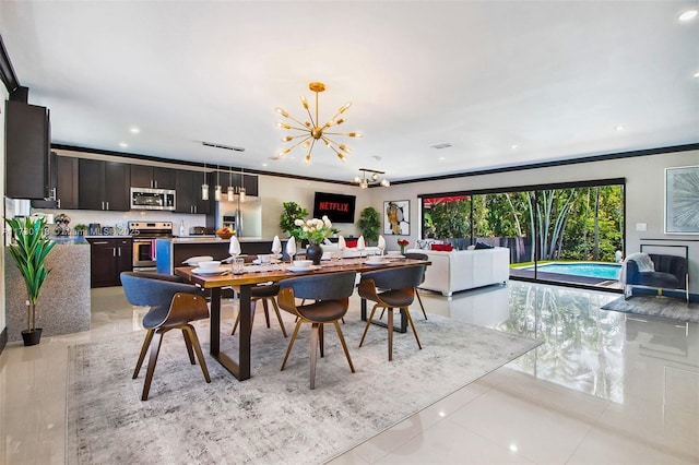 dining room featuring recessed lighting and an inviting chandelier
