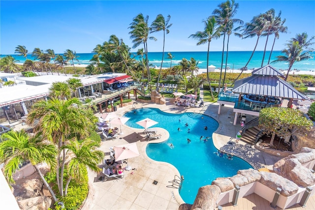 view of swimming pool with a gazebo, a patio area, and a water view