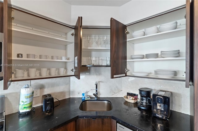 kitchen featuring sink and backsplash