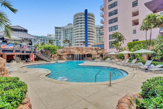5225 Collins Ave Unit 501, Miami Beach, FL 33140 - pool featuring stairs, a patio area, and a view of city