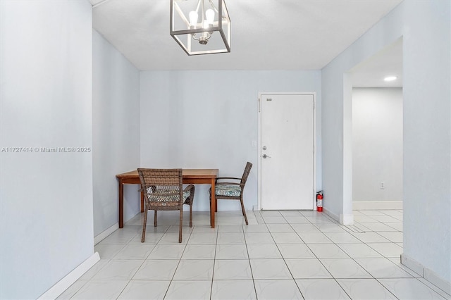 dining room with a notable chandelier