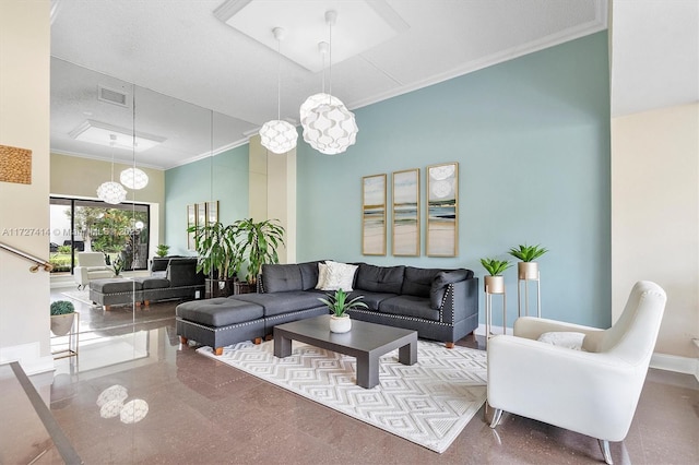 2500 NE 135th St Unit B206, North Miami, FL 33181 - living room featuring ornamental molding
