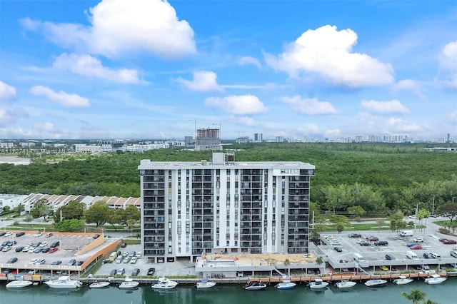 birds eye view of property with a water view