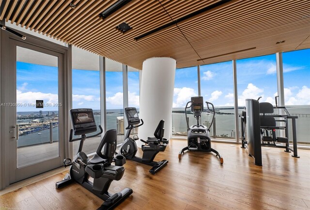 300 Biscayne Blvd Way Unit 3709W, Miami, FL 33131 - exercise room with a wall of windows and wood finished floors