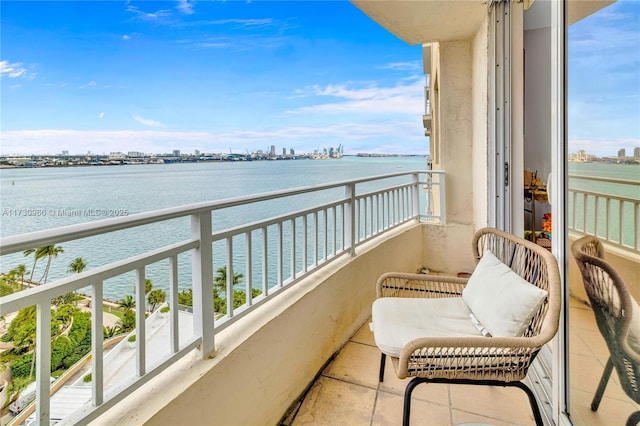 balcony featuring a water view